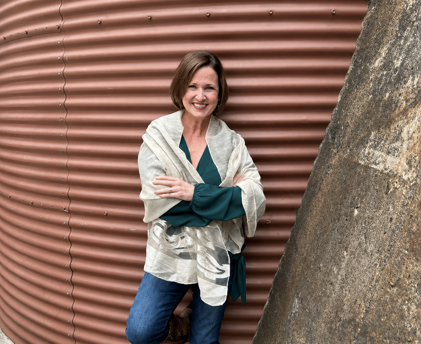Jody Cauthen standing outdoors beside a tree