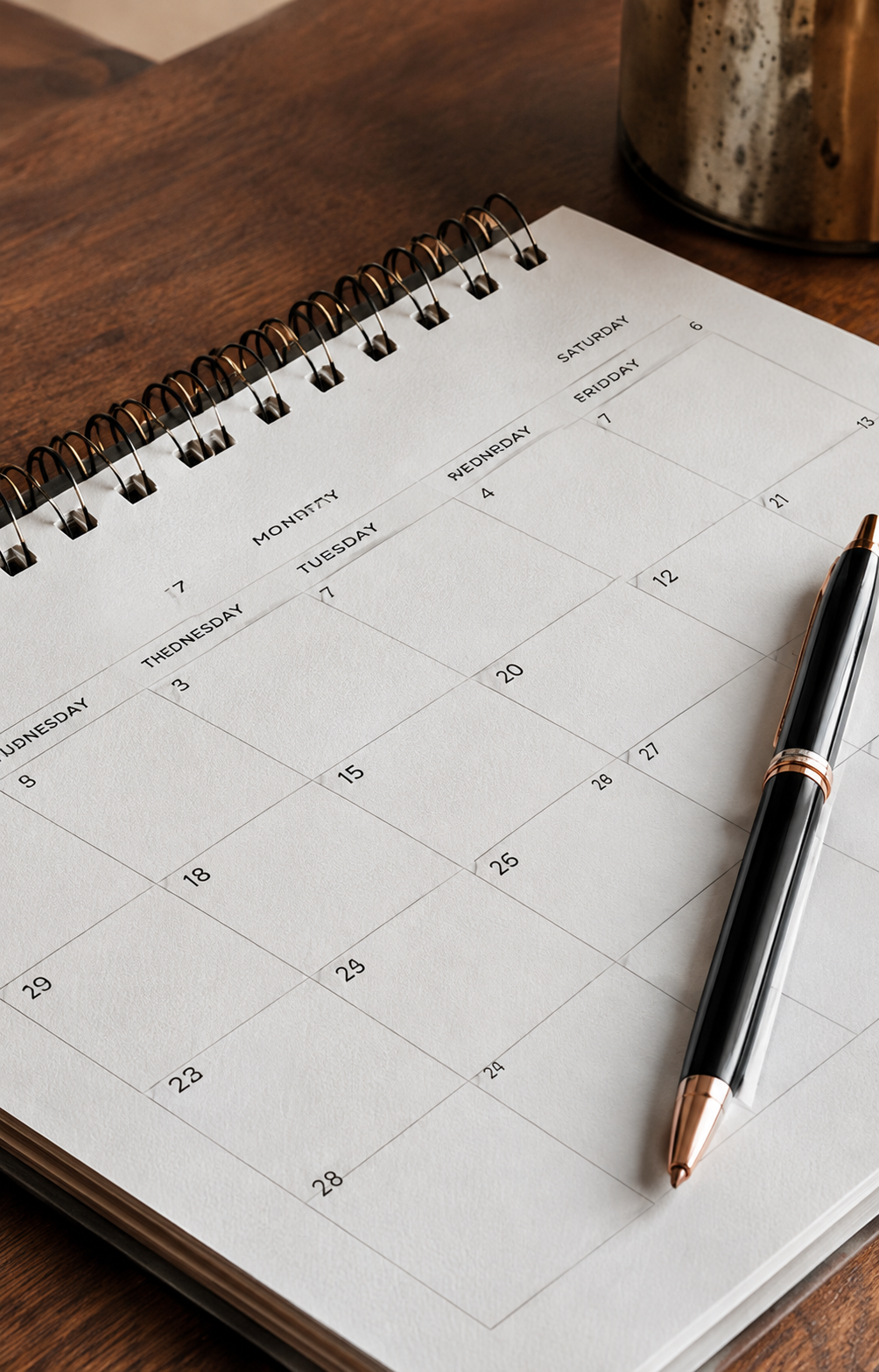 Calendar and pen for upcoming events